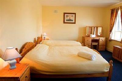 фото отеля Clonea Strand Hotel