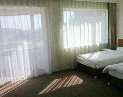 фото отеля Green City Business Hotel Dalian