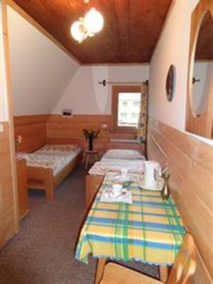 фото отеля Apartamenty Camping Harenda Pokoje Goscinne Zakopane
