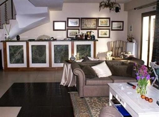 фото отеля Porto Mani Suites