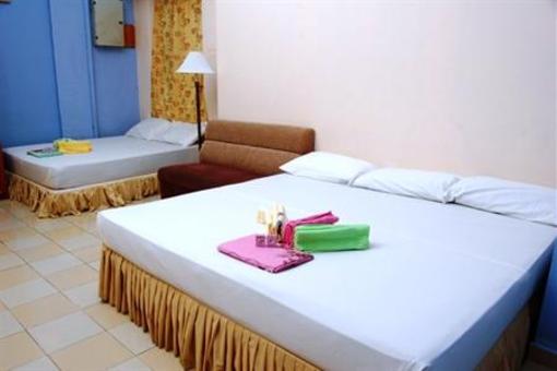 фото отеля Casavilla Travellers Lodge