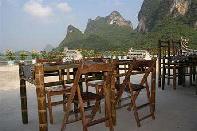 фото отеля Yangshuo Village Inn Guilin