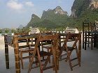 фото отеля Yangshuo Village Inn Guilin