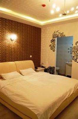 фото отеля Double Fish Business Hotel Dalian