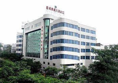 фото отеля Xingcheng Aosheng Business Hotel