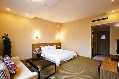 фото отеля Xingcheng Aosheng Business Hotel
