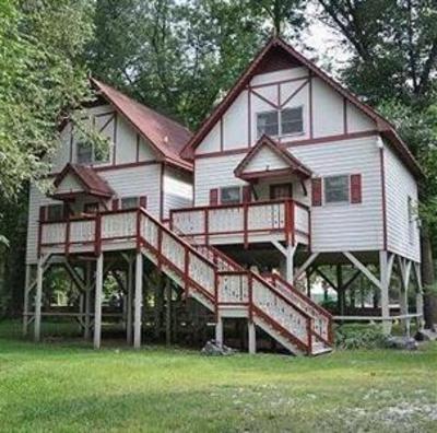 фото отеля Riverbend Motel & Cabins