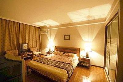 фото отеля Jing Guan Ming Lou Holiday Hotel