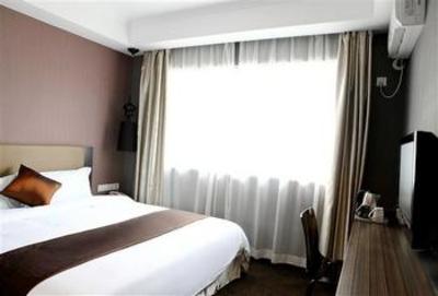 фото отеля Hotel-Zzz Zhongxin
