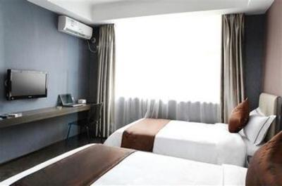 фото отеля Hotel-Zzz Zhongxin