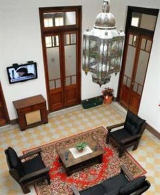 фото отеля Petit Hostel Frente al Rio
