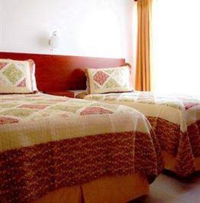 фото отеля Aparthotel Premium Suites Santa Cruz