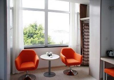 фото отеля Civil Aviation Holiday Inn Dalian