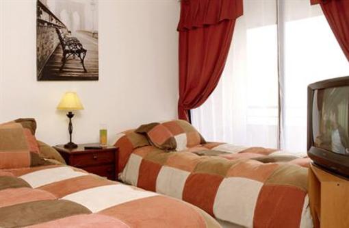 фото отеля Los Rosales Apart Hotel Las Condes
