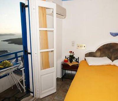 фото отеля Kafieris Apartments On The Cliff Firostefani