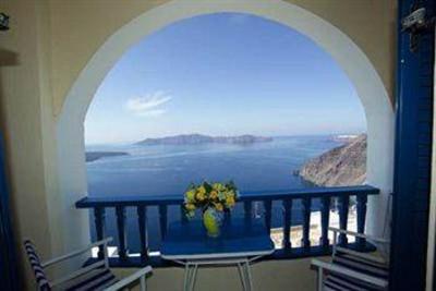 фото отеля Kafieris Apartments On The Cliff Firostefani
