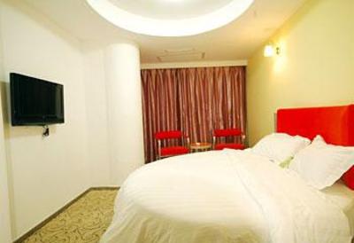 фото отеля Motel 168 Zhangjiagang Jingang Avenue