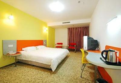 фото отеля Motel 168 Zhangjiagang Jingang Avenue