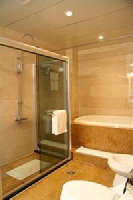 фото отеля Gurong Hotel
