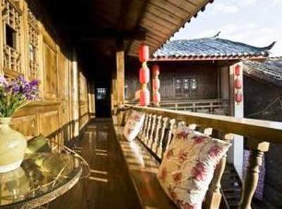 фото отеля Lijiang Lvyeanjia Inn