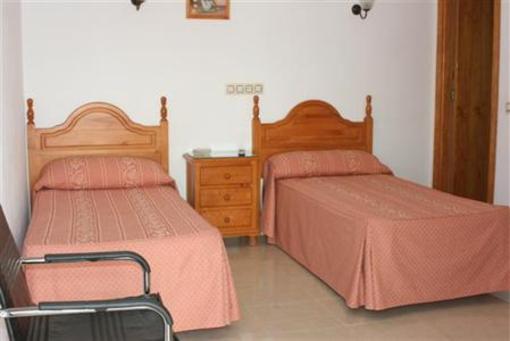 фото отеля Hostal los Arcos