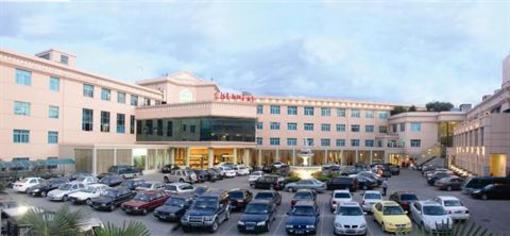 фото отеля Baixing Super Hotel