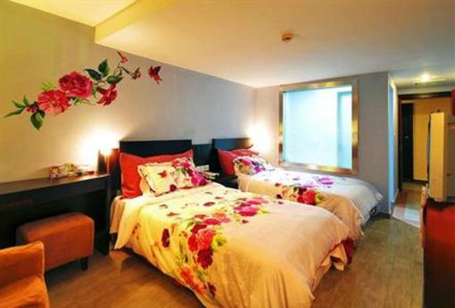 фото отеля Tongde Holiday Hotel