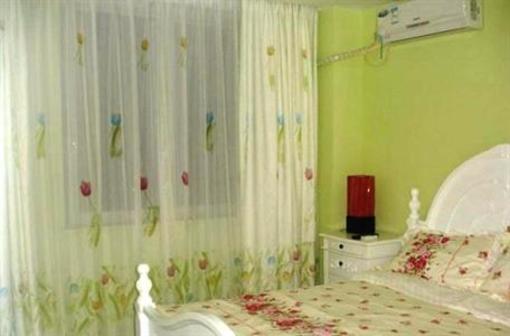 фото отеля Tongde Holiday Hotel