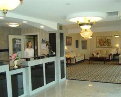 фото отеля Palm Grove Hotel and Suites