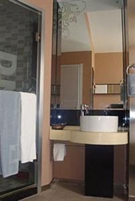 фото отеля Tiger DNA Business Hotel Songyuan Station