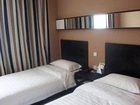 фото отеля Tiger DNA Business Hotel Songyuan Station