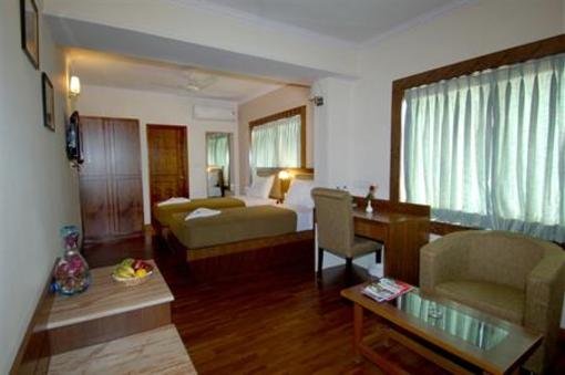 фото отеля New Rainbow Business Hotel