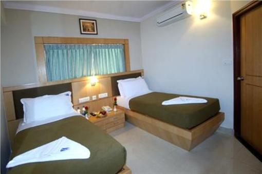 фото отеля New Rainbow Business Hotel