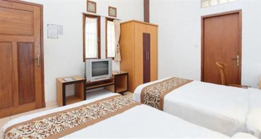 фото отеля De' Tropis Family Guest House
