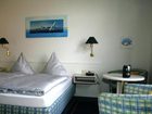 фото отеля Hotel am alten Deich Warwerort