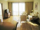 фото отеля Lee Garden Service Apartment Beijing