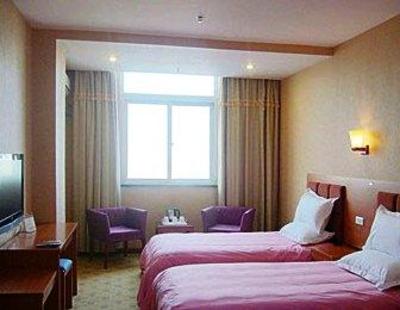 фото отеля Meiyijia Business Hotel Xinxiang Muye Park