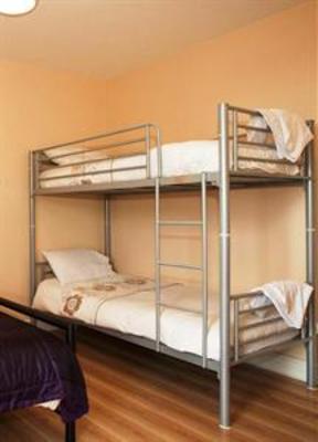 фото отеля Snoozles Hostel