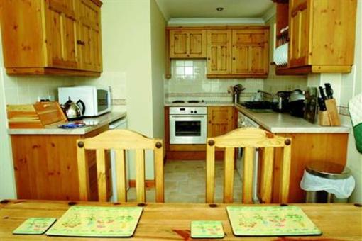 фото отеля Beachcombers Apartments