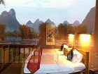 фото отеля Yangshuo Mountain Retreat