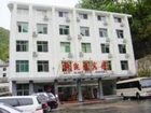 фото отеля Xinkaiyue Hotel Shennongjia