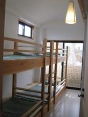 фото отеля Guesthouse 100manben Cross