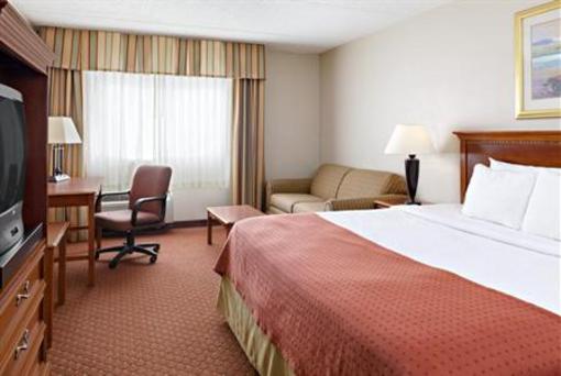 фото отеля HomeRidge Inn & Suites
