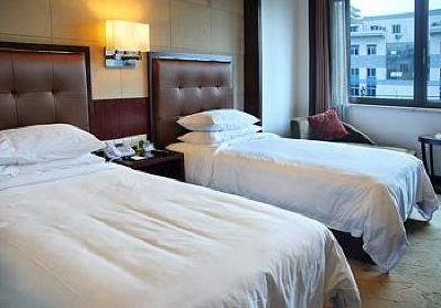фото отеля Xinzhou Ehome Hotel Diyang Road Shaoxing