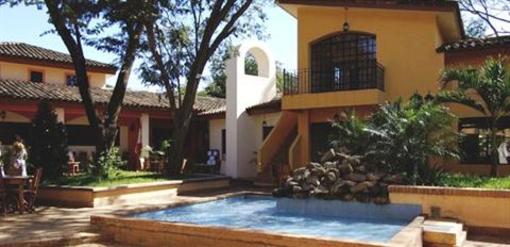 фото отеля Tropical Gardens Suites & Apartments