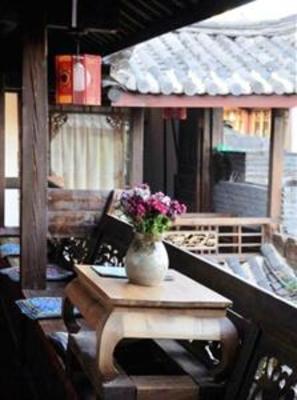 фото отеля Lijiang Wolong Villa