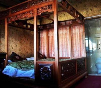 фото отеля Lijiang Wolong Villa