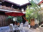 фото отеля Lijiang Wolong Villa