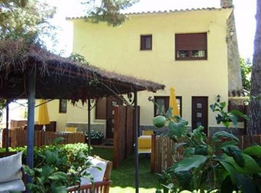 фото отеля Hostal Cal Music Premia de Dalt