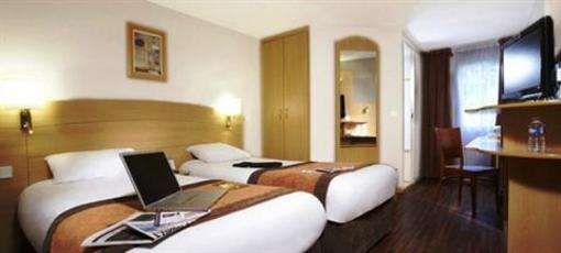 фото отеля Kyriad Saint Quentin En Yvelines Hotel Plaisir